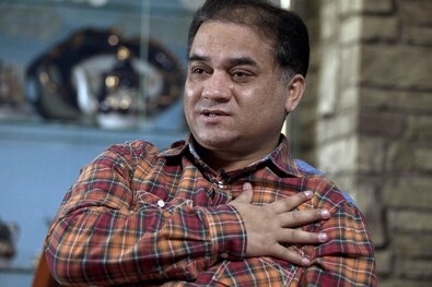 A bebörtönzött Ilham Tohti ujgur egyetemi tanár. Fotó: rfa.org / Andy Wong / AP